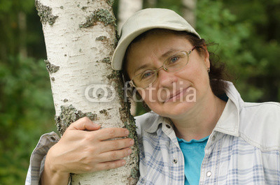 Portrait-of-a-woman-near-a-birch-forest.jpg